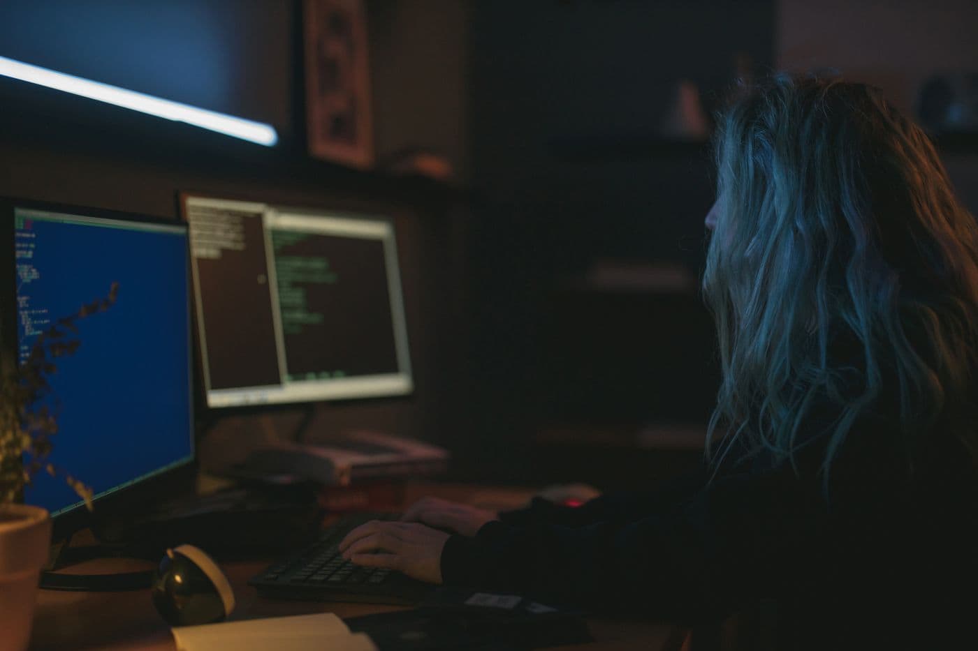 A developer building an application visually with low-code tools
