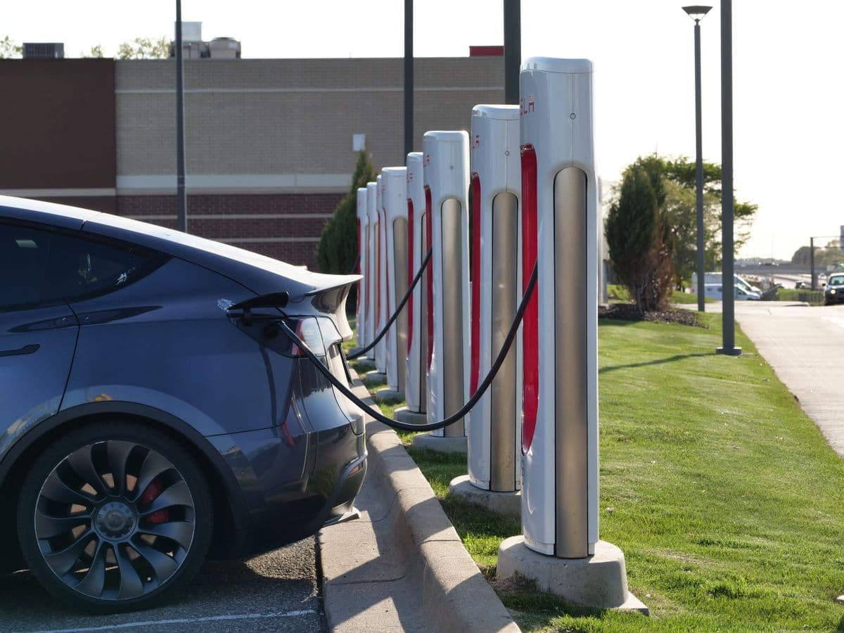 Electric vehicle charging at a charging station