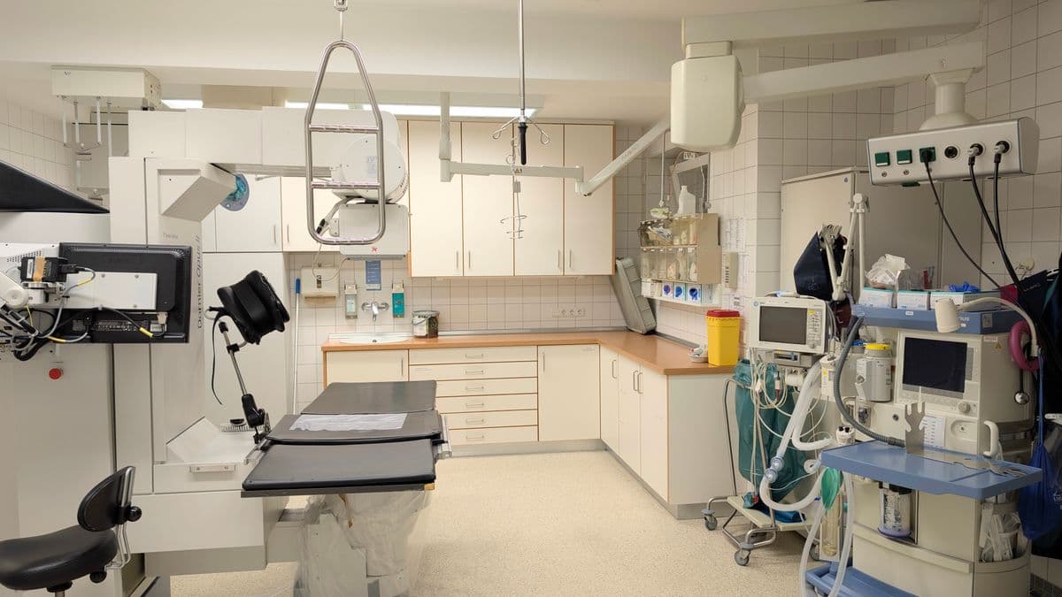 Modern hospital radiology room with X-ray imaging equipment