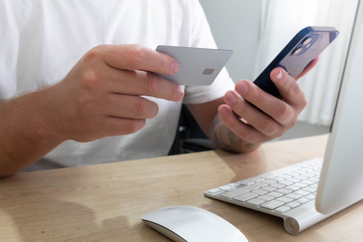 Person making a digital payment with a mobile banking app